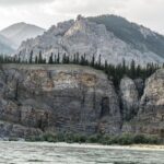 Jim Baird Instagram - New video up! (Link in bio.). This is Ep. 6 of my Hart of the Yukon series and in this one I travel through the most beautiful scenery of the trip yet. I also break out my fly road and try my had at catching Arctic Grayling on the fly. Enjoy! @travelyukon @novacraftcanoe @upnorthadventures #jbadventurer #largerthanlife #novacraftcanoe #outdoors #camping #canoeing #yukon The Yukon