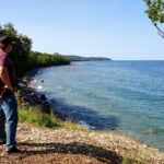 Jim Baird Instagram - This is Day 3 of my family’s cross Canada Overlanding adventure to Northern B.C. and we are just passing though Thunder Bay, Ontario after camping at Sleeping Giant last night. We’re driving our @chevroletcanada Silverado ZR2 and hauling our Expedition 2.0 off-road tear-drop by @offgridtrailers for our accommodations. I’m happy to report that the kids are doing great, and we’ve enjoyed several sights along Lake Superior’s beautiful north shore. That being said, we have also dealt with a couple hiccups - most notably, our dog North had a run-in with a skunk last night which resulted in me spending the entire morning scrubbing him in the lake with tomato sauce and toothpaste! But before leaving on this month-long adventure, we harvested a bunch of the corn, beans and squash from our three-sisters garden and have been enjoying delicious meals of ample corn on the cob and moose steaks each night. (Hudson doesn’t seem to want to wait for the corn to be cooked and hammered a whole cob and a half raw yesterday). We’re all looking forward to see what adventures lie ahead, particularly the 10-day canoe trip into Alaska down the Stikine River which we’ll reach after making our way down the rugged Telegraph Creek road. We’re going to be putting the big lake behind us soon and will push to the Kenora, Ontario area tonight. #offgridtrailers #chevroletcanada #findnewroads #sponsored #overlanding #familycamping