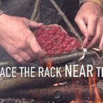 Jim Baird Instagram - Here's a fast way to dry out berries to preserve them using fire. It's far faster than sun dryin them and it worls when it's not sunny. It's also faser than treading them along a thin piece of line and hanging them up whole over a fire indoors or other which can work to dry berries too and is mroe passive though takes forever and is harder to insure the berries are fully dry that way. This is just a small scale example of how the process can be done at camp. Really, to store any significant amount of berries away for the winter this would need to be done on a far greater scale. #jbadventurer #survival #bushcraft #outdoors #camping #WildernessCooking