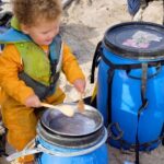 Jim Baird Instagram - New video up! (Link in bio.). In this one, @torigoesoutside and I continue down Northern BC’s Stikine River towards Alaska with our family. We camp in a couple nice places where we need to put our tarp to good use because of the rain. Breaking camp in the morning takes a lot more time with kids as they need to be fed and dressed, (you can see me putting on Wesley’s wet suit on in one of the pics here). Both adults can’t really work at camp tasks at the same time because one of us needs to keep a watchful eye on our son Hudson who likes to go for hikes (with or without us!). Things get more challenging when we’re traveling down river and the rain really picks up…it just won’t let up for hours and hours on end and we’re soaked. Come evening, we begin searching for a cabin that should be close by. Our river notes are 30 years old so we don’t really know if it’s even there anymore. Soaked to the bone, at this point we’d be very grateful for a place to get warm and dry out tons of wet cloths. Do we find it? #alaska #jbadventurer #stikineriver #canoetrip #familycamping #outdoors #campwithkids #wilderness