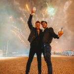 João Pedro Bernardes Instagram – Um brinde a Vocês que nos apoiam e que são, sem dúvida, a razão pela qual o Cara Coroa é a nossa vida! To you! 🤍 🌈 Lisboa, Portugal