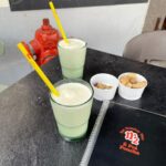 João Pedro Bernardes Instagram - Dia 2: Câmara de Lobos, Cabo Girão e as famosas bebidas Poncha e Nikita! ✌🏻🏝️ Um dia em grande 🤍 . . . #madeira #ilhadamadeira #visitportugal #visitmadeira #travel #lifestyle #foodie #couple #lgbtq #portugal #caracoroablog Funchal, Madeira, Portugal