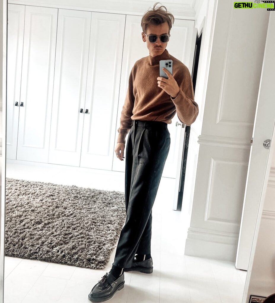 Joe Sugg Instagram - Todays outfit.. until I looked outside and saw how bad the weather is.. Jumper: @uniqloeurope Trousers: @asos_man Shoes: @drmartensofficial Specs: @lespecs Mirror: @diannebuswell’s