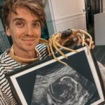 Joe Sugg Instagram - This year for halloween I went as Gilbert Kane from the movie Alien and.. SURPRISE!! little one coming soon 💕 I’m ‘Bursting’ with excitement..👽