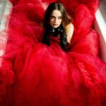 Joey King Instagram - A skirt made from the blood of my enemies for The Princess premiere ☺️ Photos by the wonderful @rogerkisby Gown by the amazing @csiriano