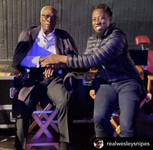John Amos Instagram - Many Thanks Wesley. It was my pleasure to work with you too Young Man! -J.A. REPOST• @realwesleysnipes How do I put into words the admiration and respect I have for @officialjohnamos? 🙏🏿 I am so deeply honored to have worked with you. 

Photo Credit: @paulyfilms00 

👑”Coming 2 America” is OUT NOW on Amazon Prime! #Coming2America

@amazonprimevideo @ZamundaRoyals 
#zamundaroyals #coming2america2 #comingtoamerica2 #eddiemurphy #wesleysnipes #generalizzi #izzidoesit #princeakeem #daywalkerklique #amazonprime #whoseauntieisthis #johnamos