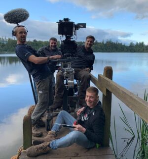 John Bell Instagram - The other side of the lens 📽✨ It takes a village to make a show like Outlander. How I miss these guys and the incredible work the whole crew does. 
@outlanderstarz
#bts #outlander #crew