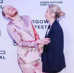 John Bell Instagram - Are you all ready for @outlander_starz returning to your screens this Sunday!?

Thank-you so much @starzplayuk @glasgowfilmfest for organising a fabulous ✨ screening. So fun to share this with my cast, friends and the amazing fans who came along.

💞👔 @eachxother 
💄💅 @anacruzmakeup