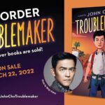 John Cho Instagram - I’ve written a middle grade novel! #JohnChoTroublemaker will be publishing March 2022 from @littlebrownyoungreaders! Preorder link in bio. And you can check out the cover reveal and an excerpt over at @entertainmentweekly