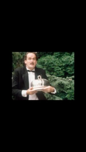 John Cleese Instagram - My favourite Fawlty Towers moment, in honor of the show’s 47th Anniversary this week. At the end of the Duck episode, Basil finally presents the covered dish to the diners, lifts the lid off, realises it’s not the duck, puts the lid on immediately….then takes it off again and searches in the mousse, in case the duck is somewhere inside.

I can’t remember whether this was in the original script, or whether we invented it on the night, but I love Basil’s refusal to give up even when things are not looking promising.

#fawltytowers #comedyscene #classictv #basilfawlty