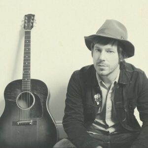 John Gallagher Jr. Instagram - My #preserverockwood show at @rockwoodmusichall is two weeks away on Friday, July 21st at 10:30 PM. Tickets on sale now at the link in my bio. All sales and proceeds go to Rockwood. I haven’t played a full band show in NYC since 2021 but this one will be extra special because I’ll be playing my debut Rockwood Music Hall Recordings release Six Day Hurricane in its entirety plus some other JGJ mainstays. Come on out and rally for Rockwood. 📸 by legend @shervinfoto from the Six Day Hurricane album art sessions.