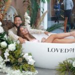 John Legend Instagram - Had so much fun at the launch of our #LOVED01 pop up! Check us out at @westfieldcenturycity in LA, open daily from 11am - 8pm until August 6th. Tag @loved01skin in your bathtub selfies for a chance to be featured on the #LOVED01 channels!