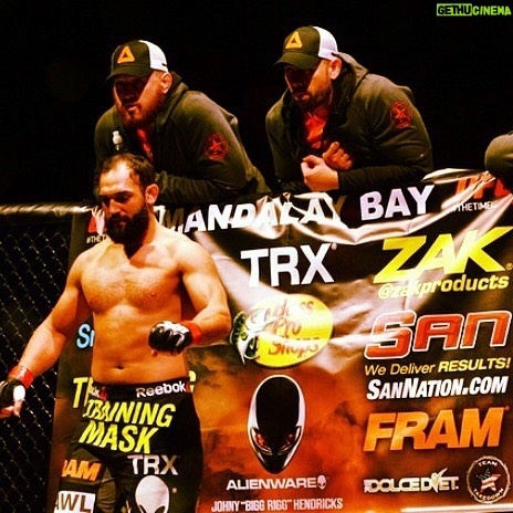 Johny Hendricks Instagram - #tbt in the cage just before @brucebufferufc does his thing! @fram_filters @trxtraining @bassproshops #ufc #fight