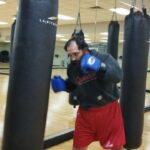 Johny Hendricks Instagram - Got some mitt work and bag work today. @reyesboxinggym is getting me ready for next week. @worldbkff #boxing #mittwork #training