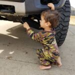 Johny Hendricks Instagram - My boy helping me work on my truck. Texas