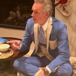 Jordan B. Peterson Instagram - Twitter suit. The tie is composed of micro Elon Musk heads. As it should be.