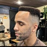 Jordan Leavitt Instagram - Before battle I focus on the things that's matter 😎 Deez hands 👐🏾 Dis hair👨🏿‍🦱 #longlivethemonkeyking I know y'all say my hair looks ridiculous when I fight 🤣 Hear me out though. I'm Black(ish), you can't expect this hair to keep its shape without product 😂 #iykyk Thankfully, it looks damn good when I'm not fighting 🙂 Thankful for @elliottandco for making me look clean. I won't wait 6 months between haircuts this time 😅