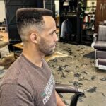Jordan Leavitt Instagram - Before battle I focus on the things that's matter 😎 Deez hands 👐🏾 Dis hair👨🏿‍🦱 #longlivethemonkeyking I know y'all say my hair looks ridiculous when I fight 🤣 Hear me out though. I'm Black(ish), you can't expect this hair to keep its shape without product 😂 #iykyk Thankfully, it looks damn good when I'm not fighting 🙂 Thankful for @elliottandco for making me look clean. I won't wait 6 months between haircuts this time 😅