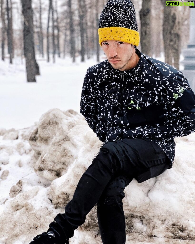 Josh Dun Instagram - here’s me sitting and standing amongst some snow in Russia. mark took these photos on a mobile cellular device. tyler and i talked about it and we liked the shows there a lot. @reelbearmedia Moscow