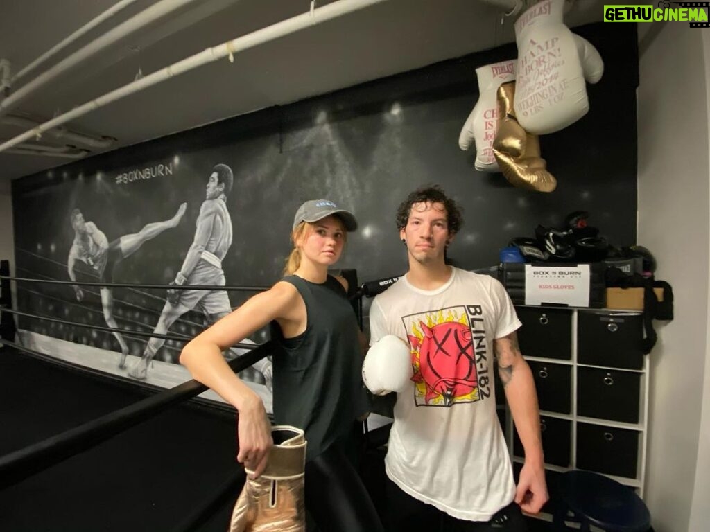 Josh Dun Instagram - debby is a boss at boxing and i sweat through my blink 182 shirt Very Tired