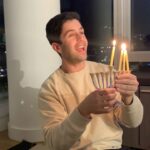 Josh Peck Instagram - When your son starts to sing Happy Birthday Hanukkah and blow out the Menorah, you realize he’s only half. #Cashew #Catholicjew