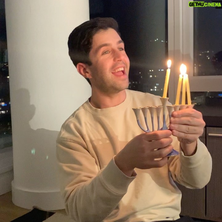 Josh Peck Instagram - When your son starts to sing Happy Birthday Hanukkah and blow out the Menorah, you realize he’s only half. #Cashew #Catholicjew
