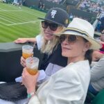 Julianna Margulies Instagram - So much fun at Wimbledon! Laughed, watched, sipped some Pimms and even got a sweaty hug from Tiafoe after his victory in the first round. @chelseahandler thanks for being my date! 💕 #wimbledon