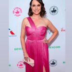 Julie Ann Emery Instagram - Had an absolutely beautiful night out with #KevinEarley at #carouselballofhope for the @cdfdiabetes and #BarabaraDavisCenter @johnlegend was magical, @deborahcox (who Kev has worked opposite) was transcendent, and I had the added pleasure of running into brilliant #BetterCallSaul pal @ed_begley_jr Felt good to be out again for a great cause. Thx to my incredible team for the support and for making me presentable! PR: @chprteam @monaloring @annakrnspr @taylorveebee Styling: @karenraphael @ilanauretsky @brandonmichaelg Makeup: @jenna.marie.beauty Hair: @lucy_gedjeyan Dress: @marialuciahohan24 Earrings: @untamedpetals Rings: @vraiofficial @effyjewelry @melindamaria_jewelry Bracelet: @vraiofficial Clutch: @tylerellisofficial (Carried quite a few of their beautiful clutches lately! My phone fits in the back slide pocket!!)
