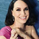 Julie Ann Emery Instagram - Had an absolutely beautiful night out with #KevinEarley at #carouselballofhope for the @cdfdiabetes and #BarabaraDavisCenter @johnlegend was magical, @deborahcox (who Kev has worked opposite) was transcendent, and I had the added pleasure of running into brilliant #BetterCallSaul pal @ed_begley_jr Felt good to be out again for a great cause. Thx to my incredible team for the support and for making me presentable! PR: @chprteam @monaloring @annakrnspr @taylorveebee Styling: @karenraphael @ilanauretsky @brandonmichaelg Makeup: @jenna.marie.beauty Hair: @lucy_gedjeyan Dress: @marialuciahohan24 Earrings: @untamedpetals Rings: @vraiofficial @effyjewelry @melindamaria_jewelry Bracelet: @vraiofficial Clutch: @tylerellisofficial (Carried quite a few of their beautiful clutches lately! My phone fits in the back slide pocket!!)