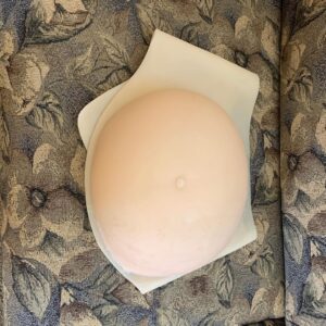 Julie Ann Emery Instagram - The many layers of Nugget. 
I named my prosthetic belly Nugget before we even started filming. And built into my character a relationship with Nugget. It helped make it real for me that I was moving through the disaster and our world for two. Eventually the Cast and even the Crew also called my belly Nugget. And I like to think that Nugget became real for all of us. 
Our Costume Designer Debra Hanson did a beautiful job both finding a belly with weight, that hung properly, and then under and over-dressing me in a way that made it feel like an extension of my own body. 
And bless @goforhugo & @costumegod for continually helping me in, out of, and navigating life for our 6 month shoot with Nugget. 

Nugget was my continual scene partner. Even in scenes alone on screen, there were two of us there. That fact affected every single moment of the show. 

So I give you Nugget. 

All Eps of #FiveDaysAtMemorial
Are now up @appletvplus 

Yes it is intense. But I hope you will give it a watch. It is important for us as a society, and everyone affected by Katrina, victim and survivor alike, deserves for their story to be told and honored.