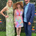 Julie Stewart-Binks Instagram - Thanks @woodbinetb for inviting my family to the first “King’s Plate” since 1951. The last few years, we’ve been watching from home and getting creative 🐴 But today was so special to witness it in person! Huge thank you to @daviddunkleyhat for the beautiful fascinator to complete my look - this dress was my grandma’s, the lovely Jean Binks ❤️ #kingsplate #woodbineracetrack #andtheyreoff #paramountprince #horseracing #canadiantriplecrown #queensplate Woodbine Racetrack