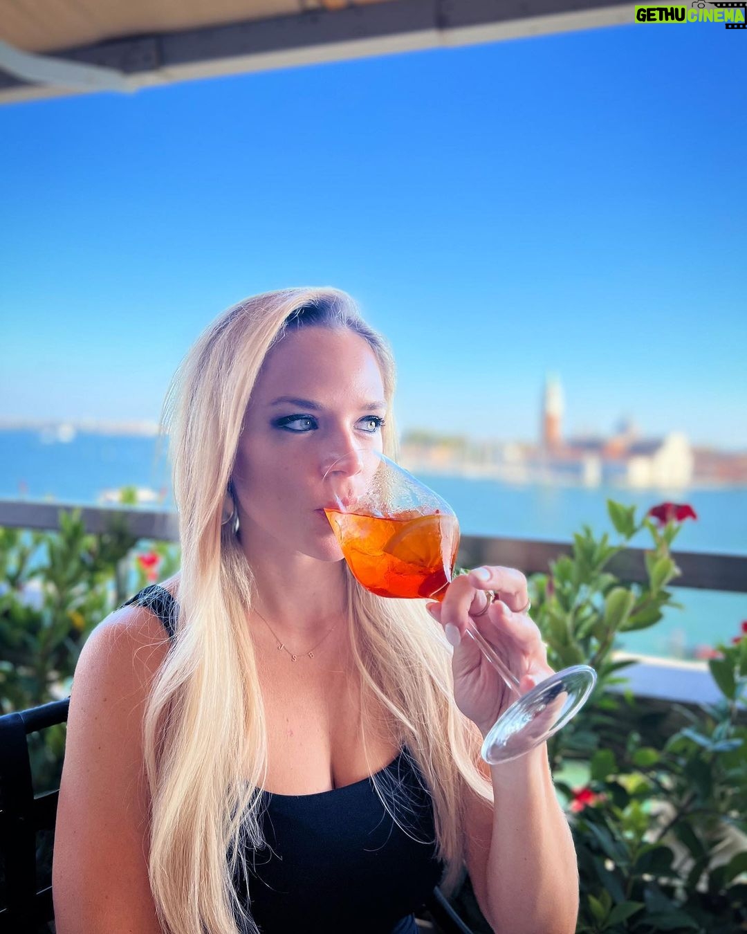 Julie Stewart-Binks Instagram - Italy, through the lens of my mom @georgiebinks ๐น๐ฎ๐น (I think she enjoyed the view ๐) @ricksteveseurope said I would โdraw approving looks from locals if I ordered spritz con aperol,โ and I took that personally ๐ซก #italy #venice #rome #positano #aperolspritz #aperoltime