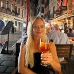 Julie Stewart-Binks Instagram - Italy, through the lens of my mom @georgiebinks 🍹🇮🇹 (I think she enjoyed the view 😂) @ricksteveseurope said I would “draw approving looks from locals if I ordered spritz con aperol,” and I took that personally 🫡 #italy #venice #rome #positano #aperolspritz #aperoltime