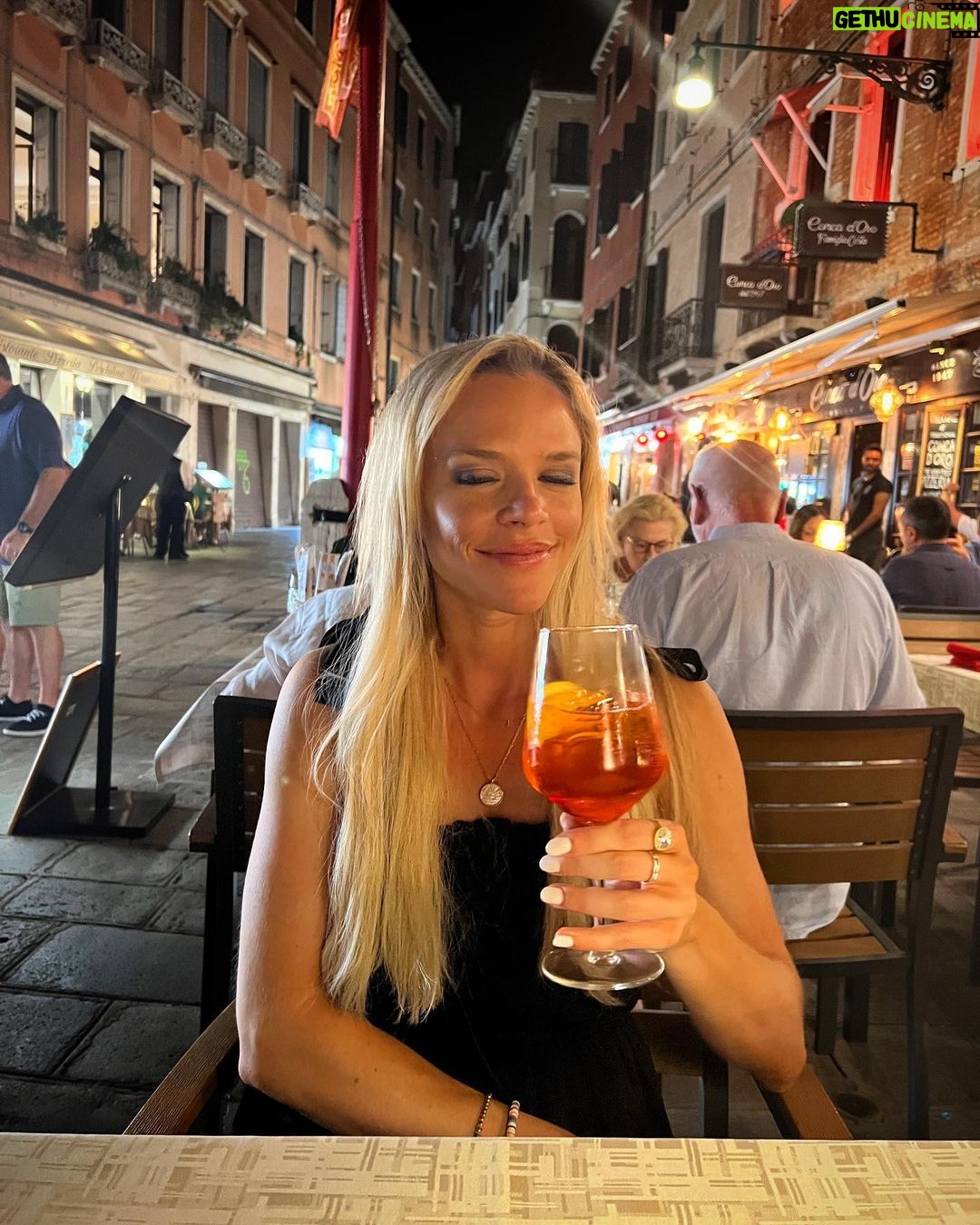 Julie Stewart-Binks Instagram - Italy, through the lens of my mom @georgiebinks ๐น๐ฎ๐น (I think she enjoyed the view ๐) @ricksteveseurope said I would โdraw approving looks from locals if I ordered spritz con aperol,โ and I took that personally ๐ซก #italy #venice #rome #positano #aperolspritz #aperoltime