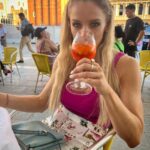 Julie Stewart-Binks Instagram - Italy, through the lens of my mom @georgiebinks 🍹🇮🇹 (I think she enjoyed the view 😂) @ricksteveseurope said I would “draw approving looks from locals if I ordered spritz con aperol,” and I took that personally 🫡 #italy #venice #rome #positano #aperolspritz #aperoltime