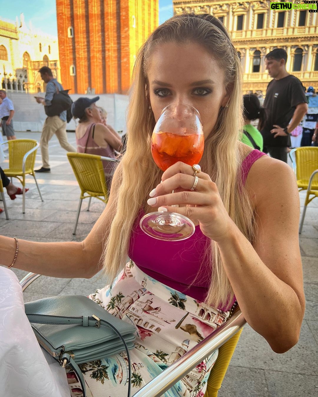 Julie Stewart-Binks Instagram - Italy, through the lens of my mom @georgiebinks ๐น๐ฎ๐น (I think she enjoyed the view ๐) @ricksteveseurope said I would โdraw approving looks from locals if I ordered spritz con aperol,โ and I took that personally ๐ซก #italy #venice #rome #positano #aperolspritz #aperoltime