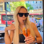 Julie Stewart-Binks Instagram - Italy, through the lens of my mom @georgiebinks 🍹🇮🇹 (I think she enjoyed the view 😂) @ricksteveseurope said I would “draw approving looks from locals if I ordered spritz con aperol,” and I took that personally 🫡 #italy #venice #rome #positano #aperolspritz #aperoltime