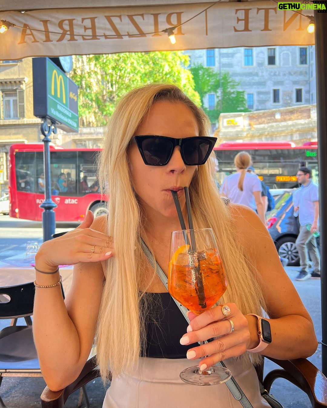Julie Stewart-Binks Instagram - Italy, through the lens of my mom @georgiebinks ๐น๐ฎ๐น (I think she enjoyed the view ๐) @ricksteveseurope said I would โdraw approving looks from locals if I ordered spritz con aperol,โ and I took that personally ๐ซก #italy #venice #rome #positano #aperolspritz #aperoltime