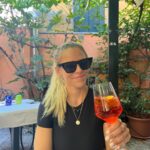 Julie Stewart-Binks Instagram - Italy, through the lens of my mom @georgiebinks 🍹🇮🇹 (I think she enjoyed the view 😂) @ricksteveseurope said I would “draw approving looks from locals if I ordered spritz con aperol,” and I took that personally 🫡 #italy #venice #rome #positano #aperolspritz #aperoltime
