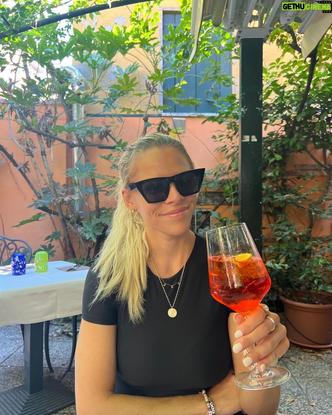 Julie Stewart-Binks Instagram - Italy, through the lens of my mom @georgiebinks ๐น๐ฎ๐น (I think she enjoyed the view ๐) @ricksteveseurope said I would โdraw approving looks from locals if I ordered spritz con aperol,โ and I took that personally ๐ซก #italy #venice #rome #positano #aperolspritz #aperoltime
