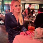 Julie Stewart-Binks Instagram – In my festive era 🎄🪩❄️

#decembertoremember #carrottop #vegas #pokerface #mariahcarey #madonna #vip #skating #christmaspartyszn #thecanuck #hockey #redtights #offair