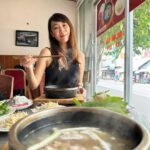 Julie Tan Instagram – Nothing beats a hot bowl of pho in the heart of Vietnam. Savouring every spoonful and soaking up the culture – this is living in the moment 🍜🇻🇳 #PhoNomenal #VietnamAdventures Ho Chi Minh City, Vietnam