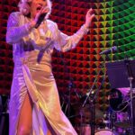 Justin Vivian Bond Instagram - That’s a WRAP! Boundless gratitude to all who showed up and sustained me during what turned out to be an emotionally tumultuous 2023. If I hadn’t had performances and welcoming crowds throughout the year I don’t even want to think about what I would have been like. Thank you to @joespub and my incredible band. I love you. And now Mother is on hianus for a few weeks. 🙌🏻⛱️🏝️☀️🥂💋 #glamourisresistance #queerartsaveslives Photo 1: @mysonwearsheels Photo 2: @lukakatznyc Joe's Pub