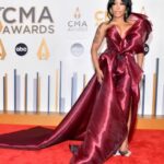 K. Michelle Instagram - Stylist: #Emmatrask Assistant stylist: @nova_inc._ Makeup: @pounddcakee_ Hair: @daisydoesmyhair Gown: @maisonmet Shoes: @hardot Jewelry: @seasonalwhispers Bag:@solomeinajewelry #cma #2023 @kimberlyispuddin ❤️❤️❤️❤️❤️