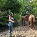 K. Michelle Instagram - Today I climbed a tree and walked through a stream in my fav boots with my favorite horse “BISCUIT” . I never felt so excited and alive. I really deserve this life. Today my dear friend told me “Don’t postpone your joy” 🙌🏾 @kimberlyispuddin