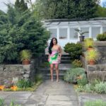 K. Michelle Instagram - “You work hard for clout to be seen. I work hard to disappear. We are not the same” IM THE PROBLEM (pulled a wrinkled sundress out my luggage, and of course I ended up in a garden. I literally be OUTSIDE with Mother Nature every chance I get) 🌻 We HAD A TIME! @kimberlyispuddin