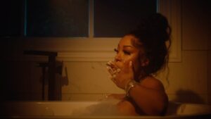 K. Michelle Instagram - There’s this man I love, he’s not mine at all❤️‍🩹 head over to my YouTube. Above