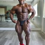 Kai Greene Instagram - Which Pose?! 1 or 2 💪🏾 When we're ever feeling stuck the best thing we can do is start. Success, results, and the whole process in between doesn't happen overnight. Instead, it is the result of small steps taken every day. And when you take these steps repeatedly, you learn how to tap into your potential. When it comes to creating more power and control from the ground up, nothing compares to @ryderwear D-MAKs! The trusted shoe to get your feet as close to the ground as possible, maintaining balance and stability in a way that many other shoes simply can't. Lace up a pair today and experience strength in numbers! #KaiGreene #Ryderwear Redcon1 Gym