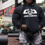 Kai Greene Instagram - WE DONT SKIP LEGS!! Watch @andrewjacked and me making gains with a full leg day session 🏋🏿‍♂️ It was a honor to hit the gym with Andrew, keep an eye out for him on the stage this year. 🔋 Powered by @corechamps ▶️ YouTube: Kai Greene