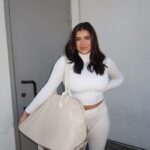 Kalani Hilliker Instagram - Travel in style this holiday season with the perfect Karry-All Bag 🎄🤍 last 3 days of the 12 days of Christmas 30% off site wide sale! Shop @karebykalani and use code HOLIDAYCHEER🧖🏼‍♀️💋✨
